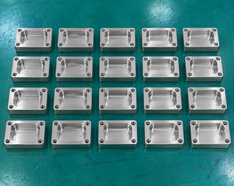 Mass-produced CNC milled aluminum housings with radiused internal corners.